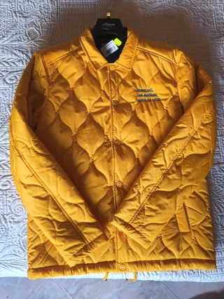 Giubbino trapuntato Guess giallo