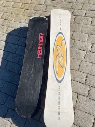 Tavole da snowboard con attacchi