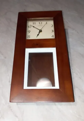 Orologio da parete antico in legno