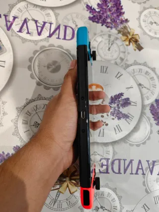 Nintendo Switch OLED Azul y Rojo + Zelda BOTW.