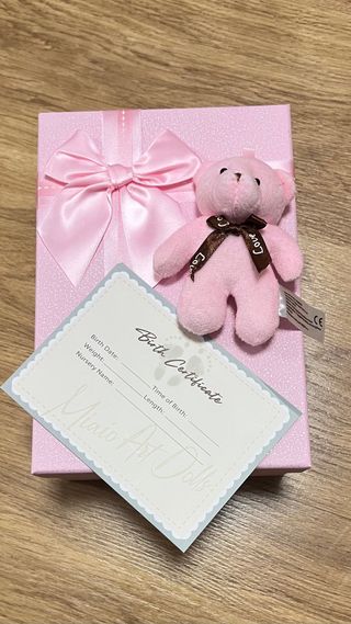 Muñeca bebé silicona con accesorios (20 cm)