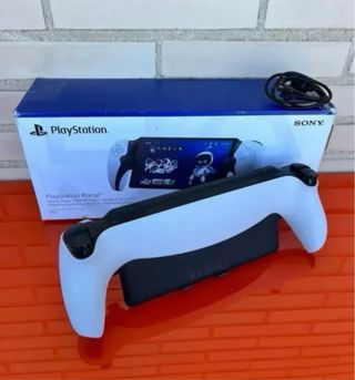 Playstation Portal impoluta con su caja y factura