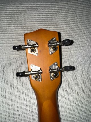 Ukelele marrón Marca Vintage