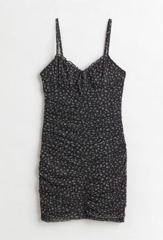 Vestido mini negro estampado flores