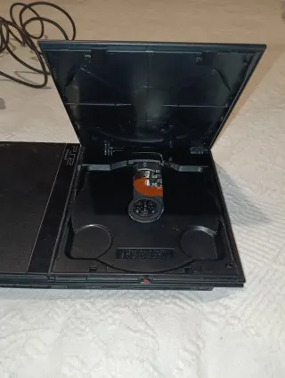 PlayStation 2 Slim Nera con Mando e Cavi