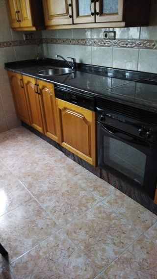 Muebles de cocina madera y mármol