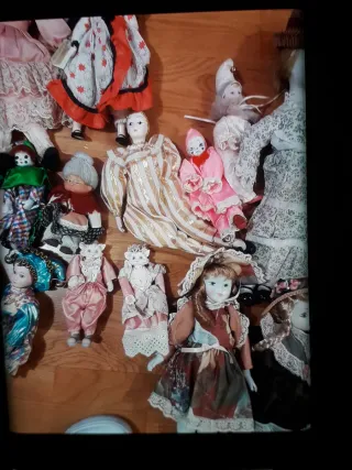 Lotto di bambole in stoffa e porcellana vintage