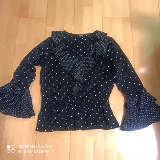 Blusa flamenca lunares. LEER