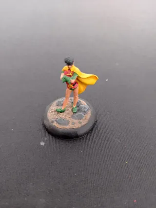 Figuras de metal de DC