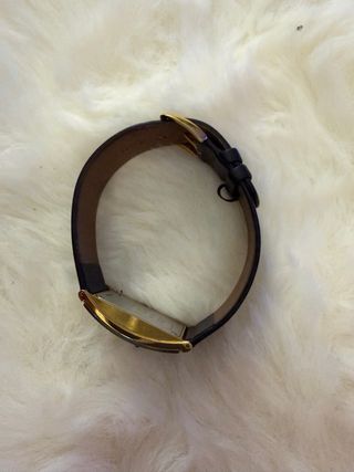 Reloj Rado Negro y Dorado