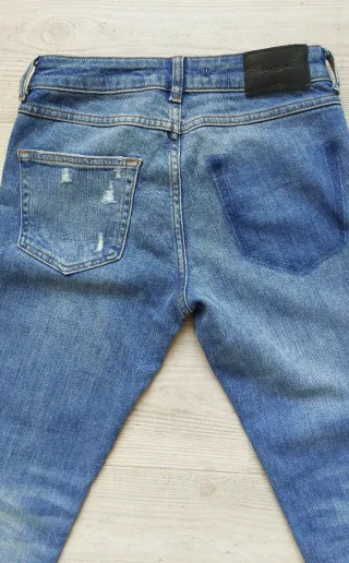 Pantalón vaquero mujer desgastado