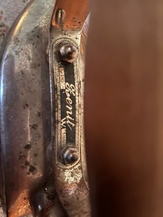 Ferro da stiro antico in metallo