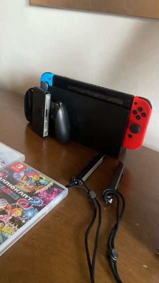 Nintendo Switch con mando y juegos y tarjeta sd 64