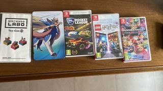 Nintendo Switch con mando y juegos y tarjeta sd 64