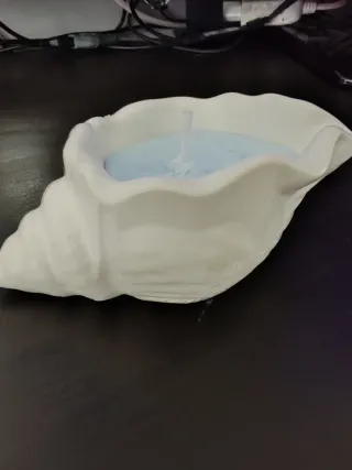 Candela a forma di conchiglia in ceramica