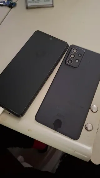 Samsung Galaxy A52 parti o batteria