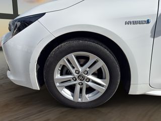 Corolla 1.8 125H BUSINESS PLUS E-CVT TOU SPORT