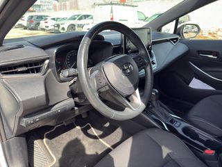 Corolla 1.8 125H BUSINESS PLUS E-CVT TOU SPORT