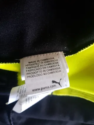 Chaqueta Puma Negra y Amarilla niño 13-14