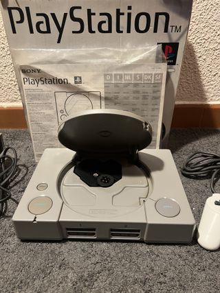 PlayStation 1 con scatola originale