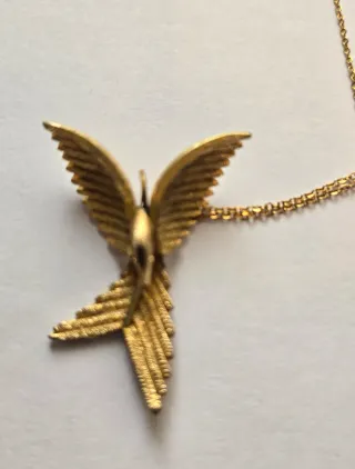 Colgante de pájaro dorado