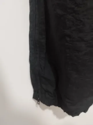 Pantaloni Fila neri con banda viola e verde