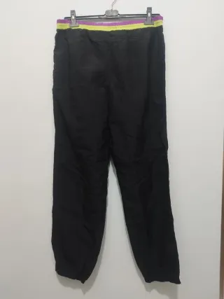 Pantaloni Fila neri con banda viola e verde