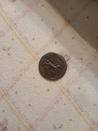 Moneta antica con profilo