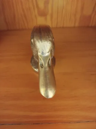 Antiguo abrebotellas cabeza de pato