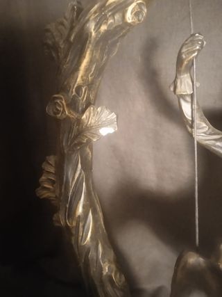 Escultura pareja columpio