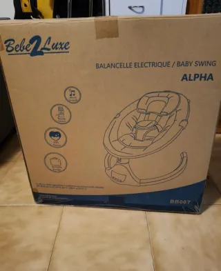 Mecedora bebé con dos peluches