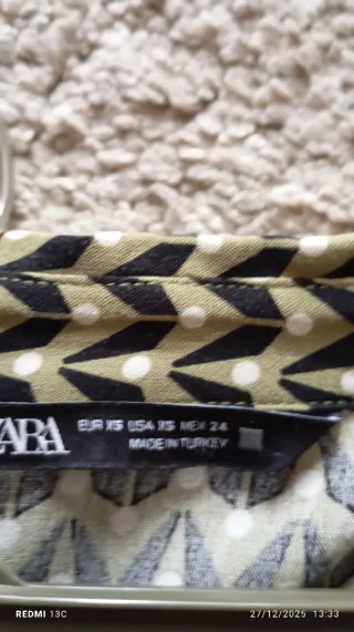 Camisa estampada verde e preta