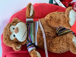 Peluche scimmia con maglietta .Come nuovo