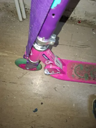 Patinete Oxelo rosa y morado
