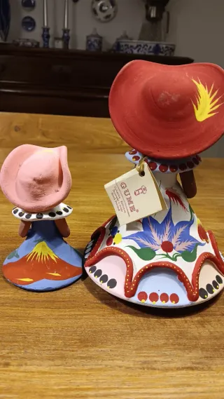 Bamboline in ceramica dipinta a mano