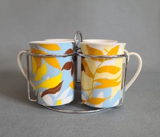 Juego 4 Tazas Cerámica con Soporte de Metal