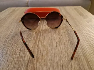 Gafas de sol Guess doradas y marrones