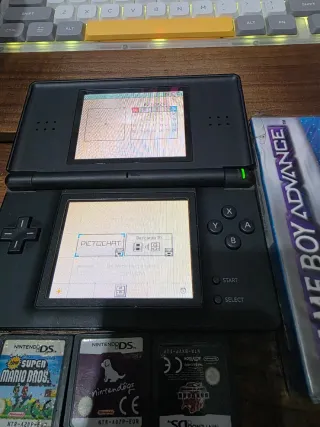 Nintendo DS Lite Nera (cerniera rotta) + Giochi