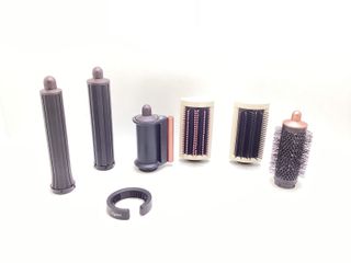 secador pelo dyson hs05