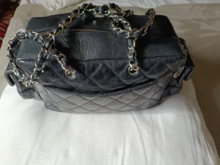 Bolso piel negra Chanel cambon reporter