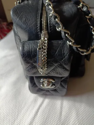 Bolso piel negra Chanel cambon reporter