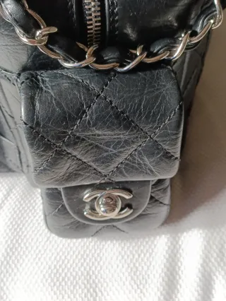Bolso piel negra Chanel cambon reporter