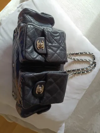 Bolso piel negra Chanel cambon reporter