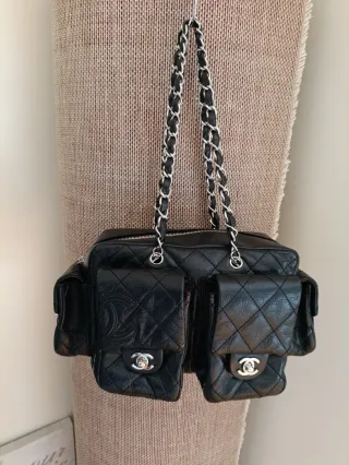 Bolso piel negra Chanel cambon reporter