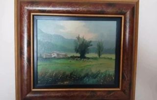 Cuadro paisaje rural con casa y ovejas