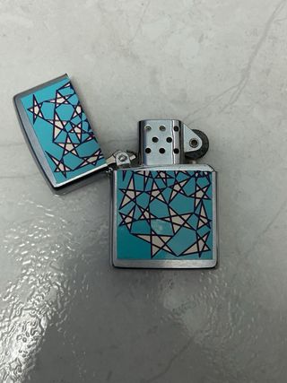 Accendino Zippo con disegno stelle