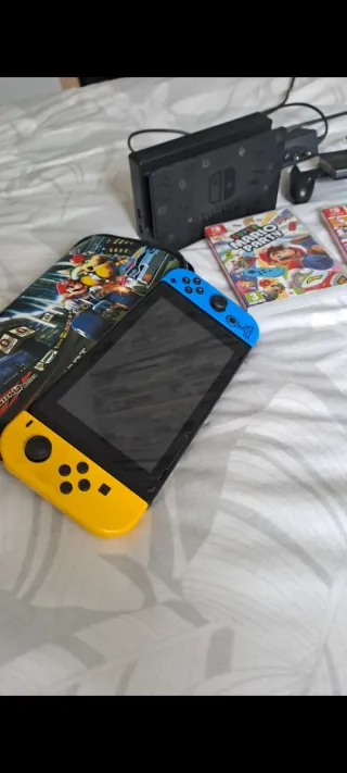 Nintendo Switch + Accesorios y Juegos