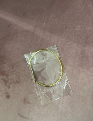 Pulsera Dellafuente dorada con frase