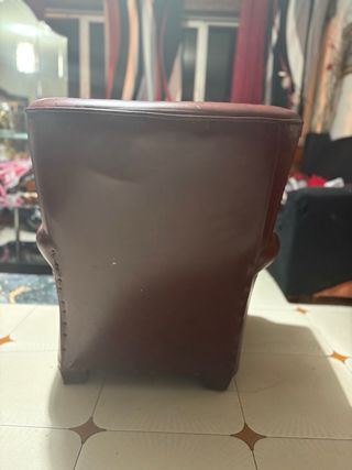 Sillón de piel y tela estampado