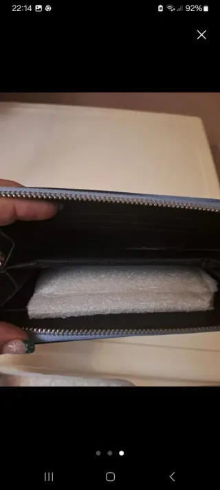 Cartera monedero azul con tacón brillante